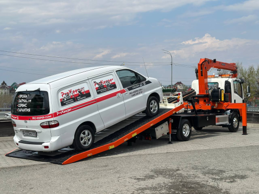 Эвакуаторная платформа 4.5 т с КМУ 3.2 т на шасси Isuzu Elf