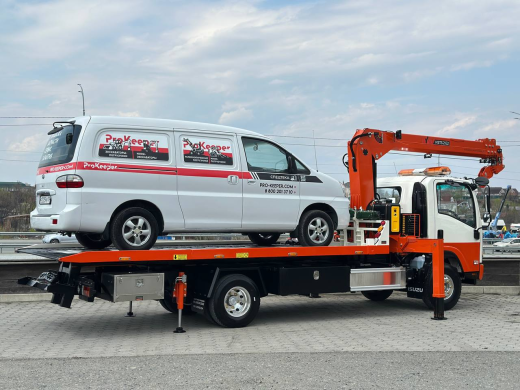 Эвакуаторная платформа 4.5 т с КМУ 3.2 т на шасси Isuzu Elf