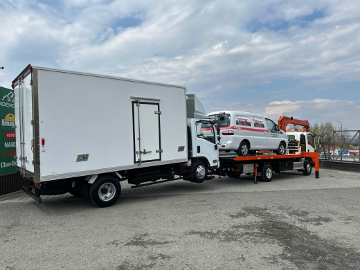 Эвакуаторная платформа 4.5 т с КМУ 3.2 т на шасси Isuzu Elf